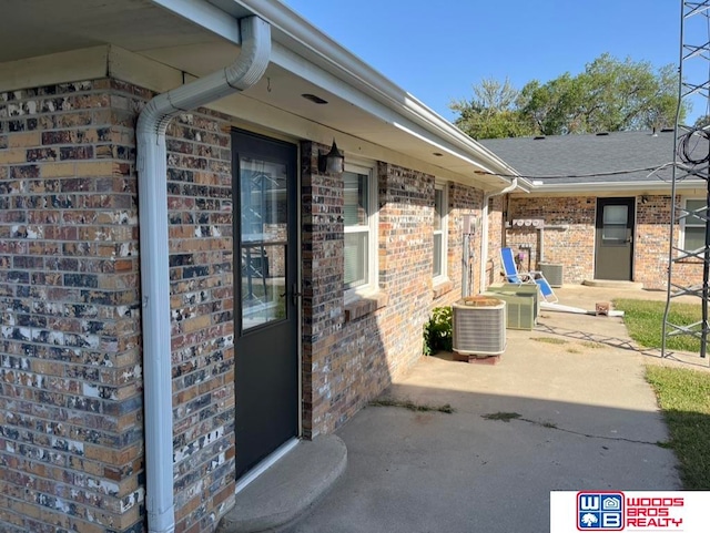 property entrance with a patio area