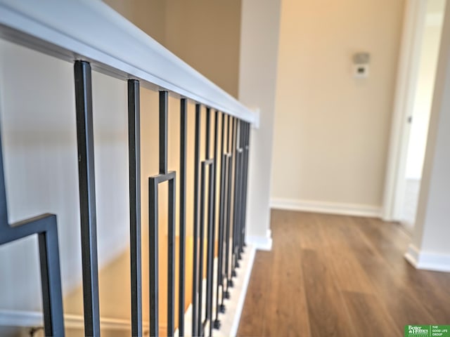 hallway featuring hardwood / wood-style flooring