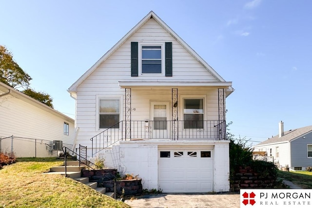 bungalow-style house featuring a garage