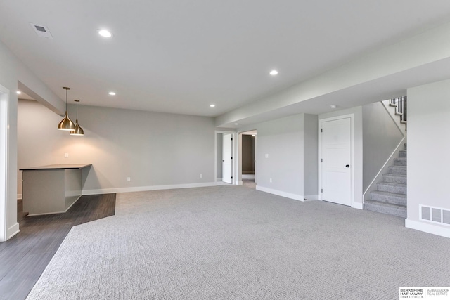 interior space with dark hardwood / wood-style floors