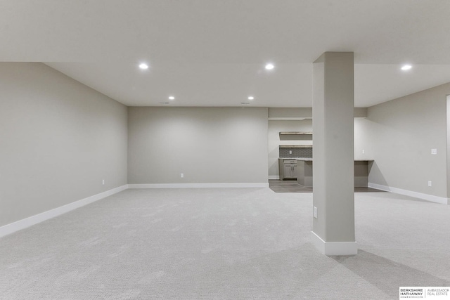 basement with light carpet