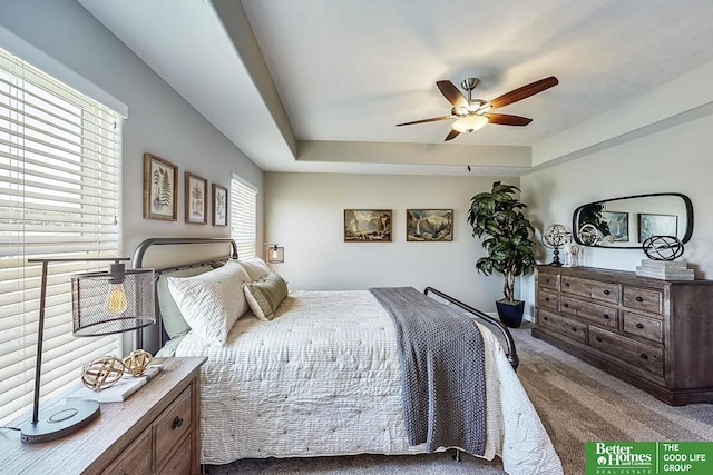 carpeted bedroom with ceiling fan