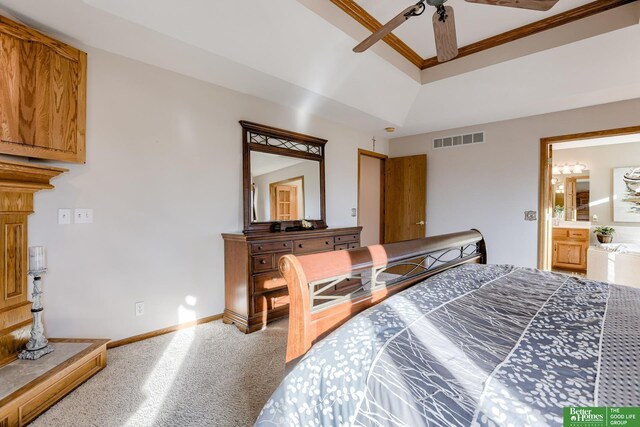 bedroom with carpet flooring, ensuite bath, ceiling fan, and crown molding