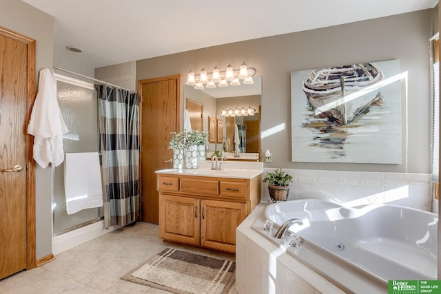 bathroom featuring shower with separate bathtub, tile patterned floors, and vanity