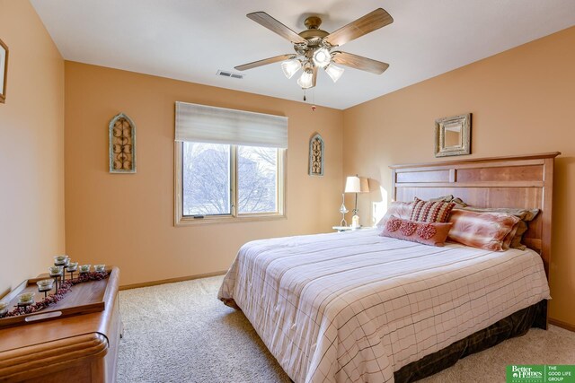 carpeted bedroom featuring ceiling fan