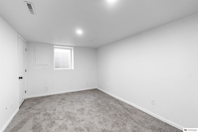 empty room featuring carpet flooring