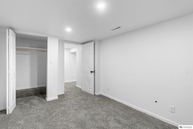 unfurnished bedroom featuring a closet and carpet