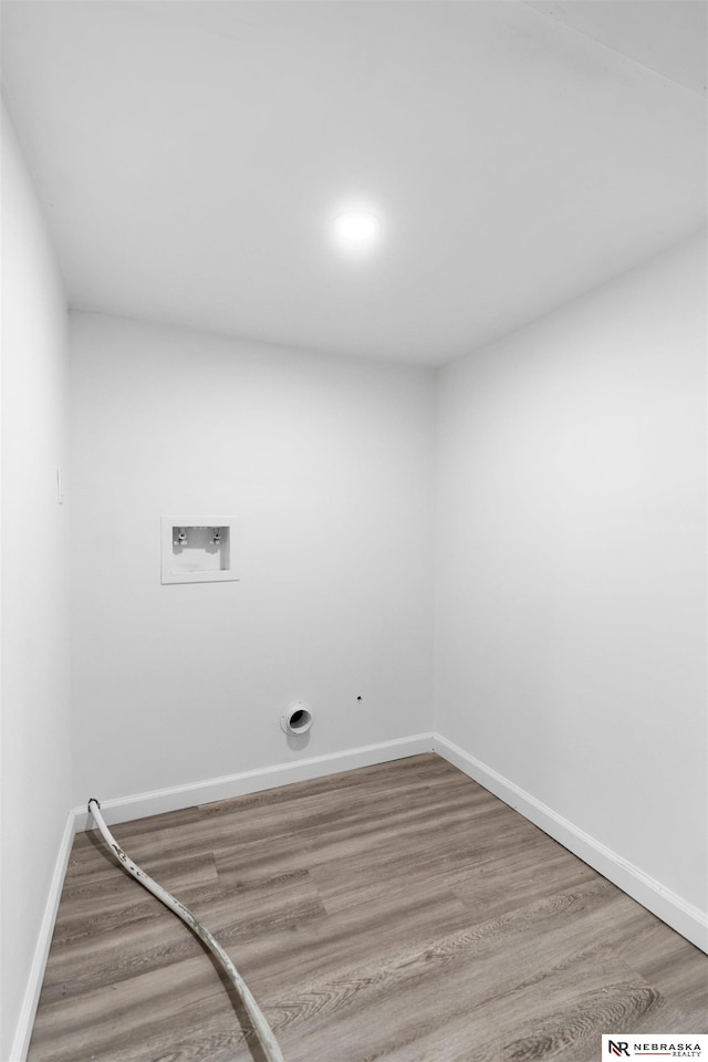 washroom featuring hardwood / wood-style floors and washer hookup