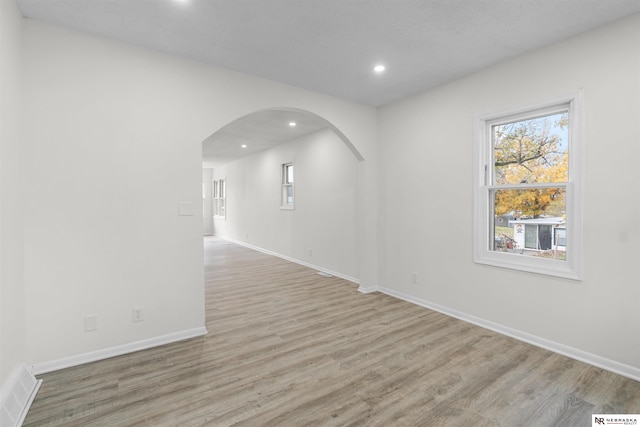 empty room featuring light hardwood / wood-style floors