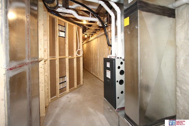 basement featuring heating unit