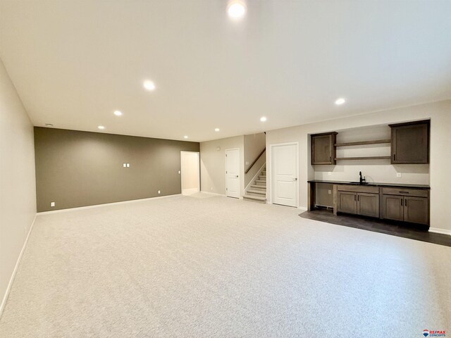 basement with dark carpet