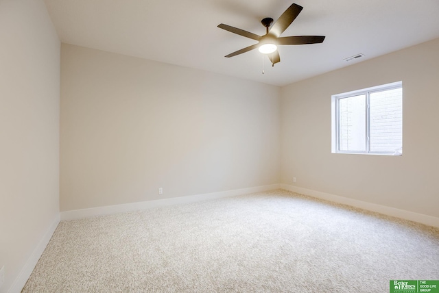 carpeted empty room with ceiling fan