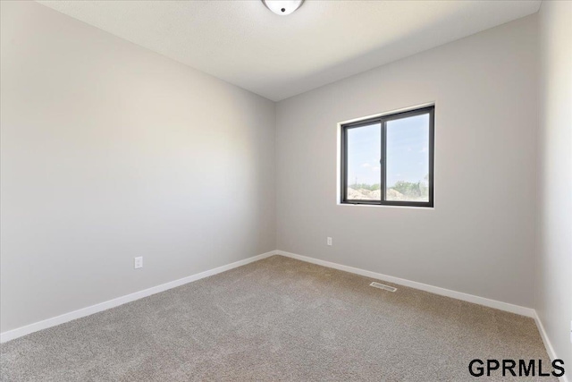 216 St Andrews Loop, Malvern, IA 51551 - spare room with carpet and baseboards