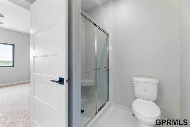 216 St Andrews Loop, Malvern, IA 51551 - bathroom with baseboards, a shower stall, toilet, and marble finish flooring