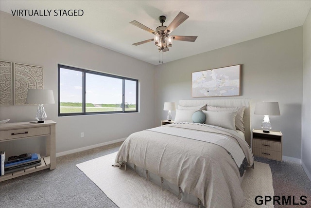 216 St Andrews Loop, Malvern, IA 51551 - bedroom featuring carpet flooring, baseboards, and ceiling fan