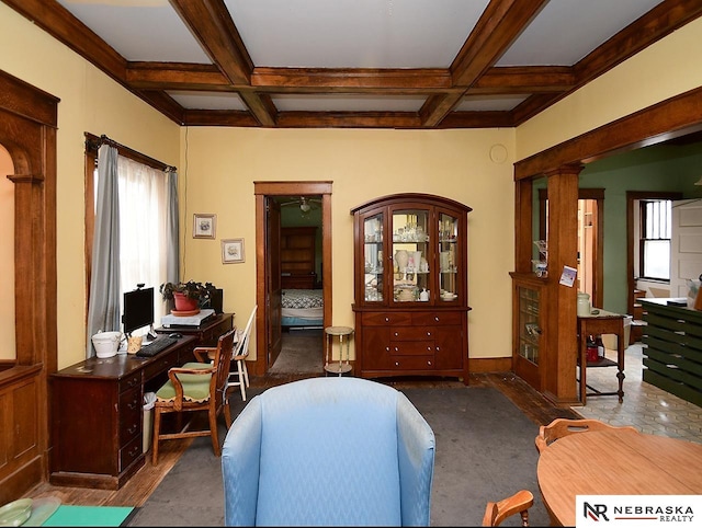 office area featuring plenty of natural light, beamed ceiling, and coffered ceiling