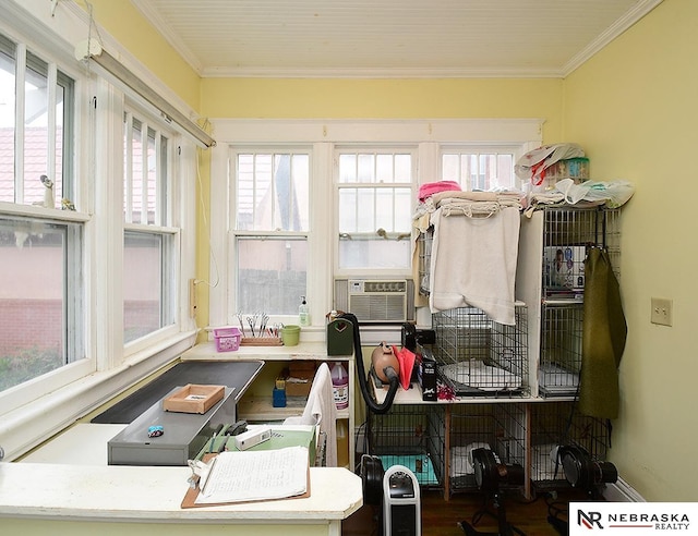 interior space featuring plenty of natural light and cooling unit