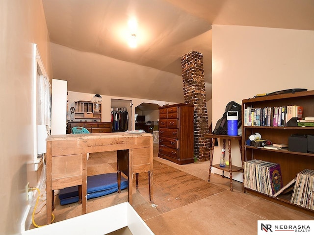 office space with lofted ceiling