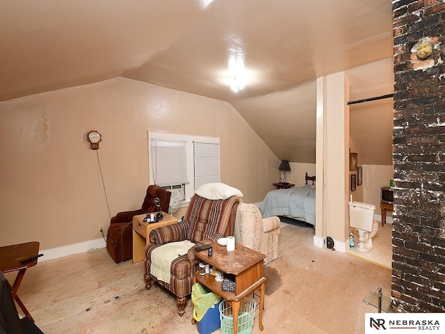 bedroom with lofted ceiling