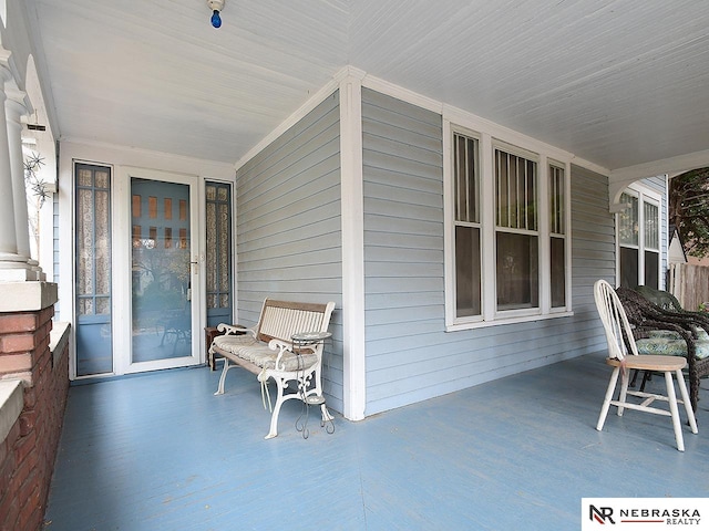 view of patio featuring a porch