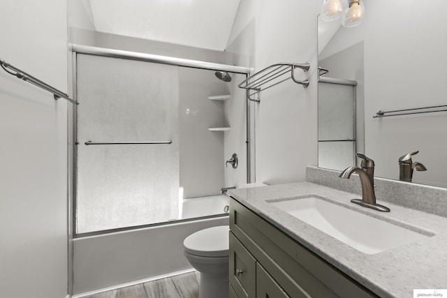 2119 N 144th Ave, Omaha, NE 68116 - bathroom with vanity, toilet, bath / shower combo with glass door, and wood finished floors
