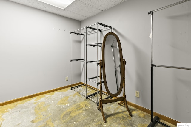 2119 N 144th Ave, Omaha, NE 68116 - exercise room featuring baseboards and a paneled ceiling