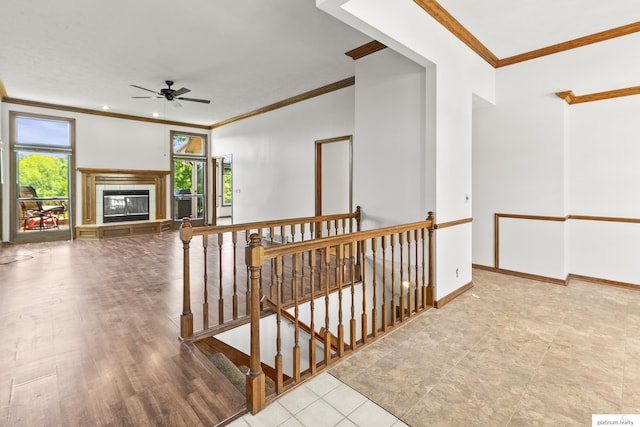 2119 N 144th Ave, Omaha, NE 68116 - hallway featuring an upstairs landing, crown molding, and baseboards