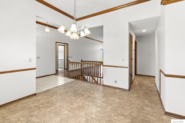 2119 N 144th Ave, Omaha, NE 68116 - spare room with a chandelier, ornamental molding, baseboards, and tile patterned flooring