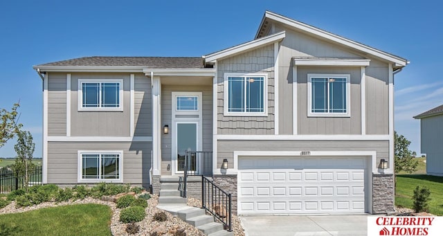 view of front of property with a garage