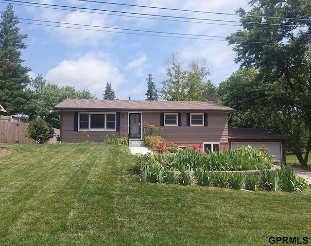 view of front of home with a front lawn