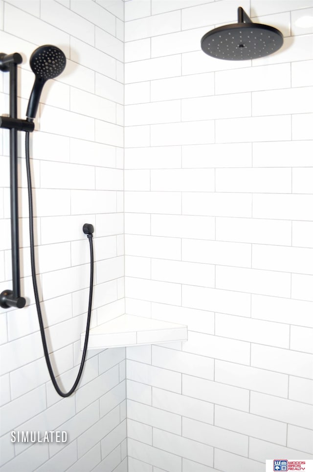 bathroom featuring tiled shower