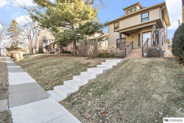 view of front of home with a front lawn