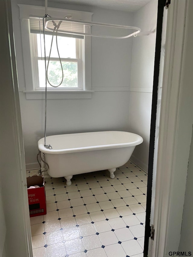 bathroom with a washtub