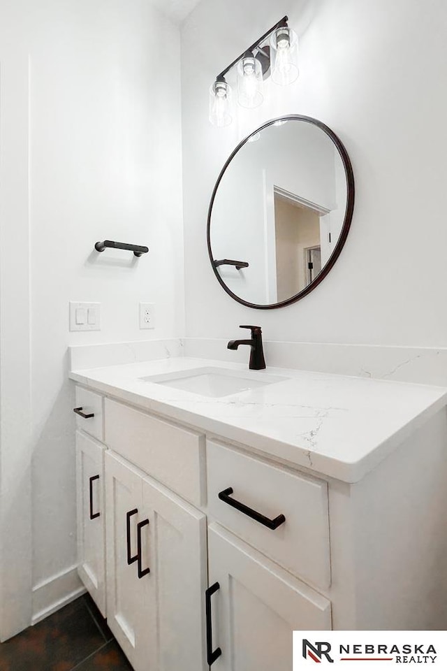 bathroom featuring vanity and tile patterned flooring