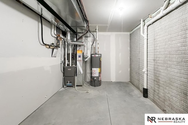 utility room featuring heating unit and water heater