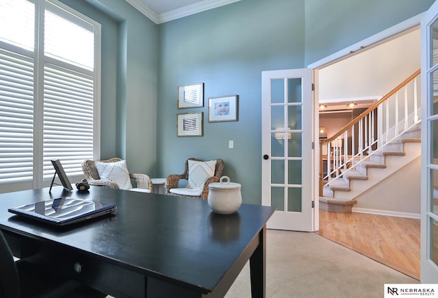 home office with ornamental molding, hardwood / wood-style flooring, and french doors