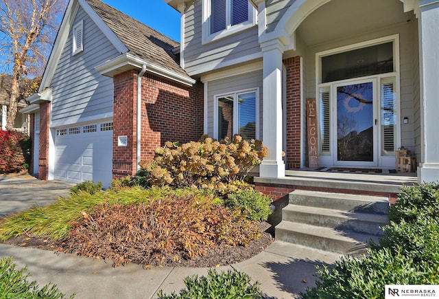 property entrance with a garage