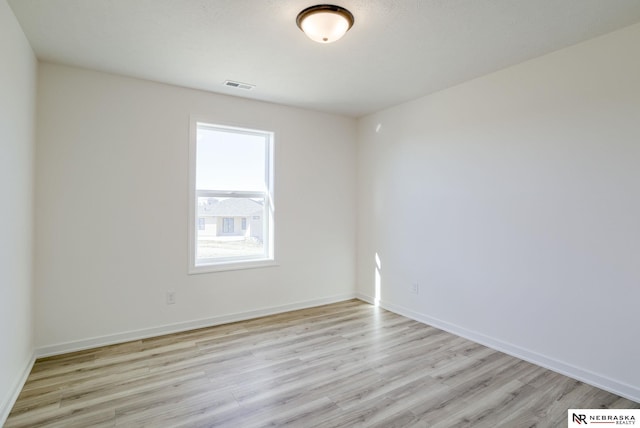 empty room featuring light wood-type flooring