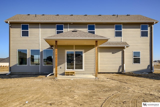 back of house featuring a patio area