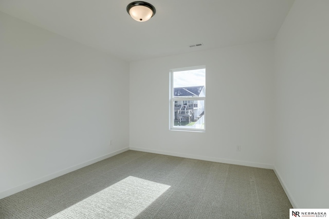 spare room with carpet flooring