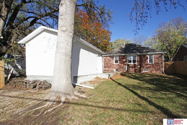 exterior space with a yard