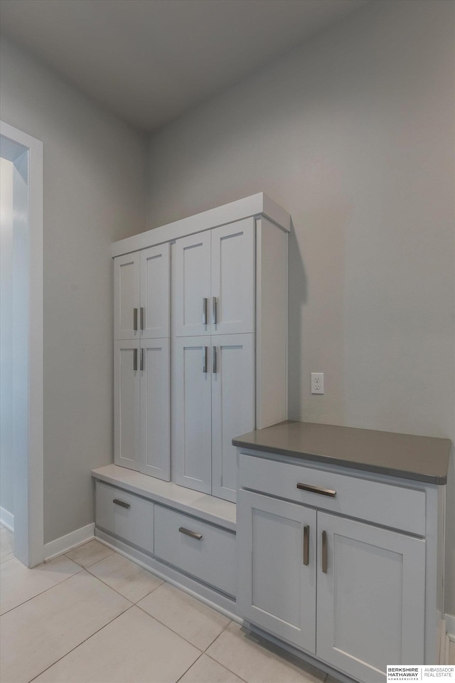 mudroom featuring light tile patterned flooring