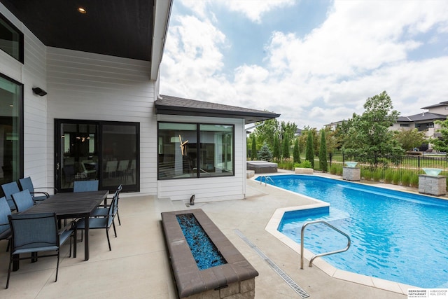 view of pool featuring a patio