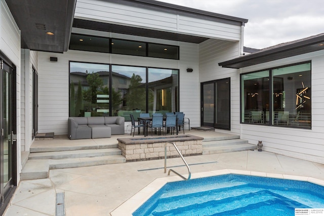 view of pool featuring a patio area