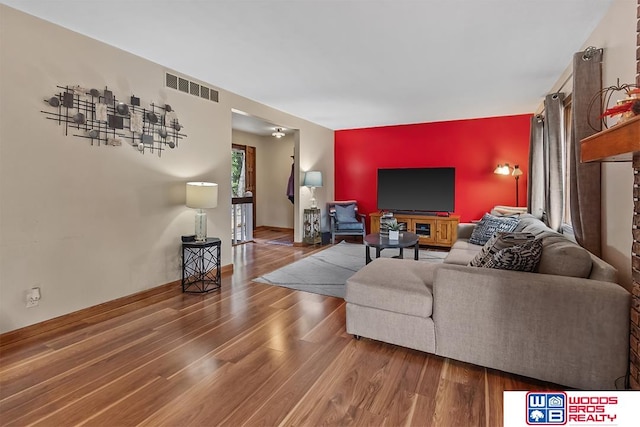 living room with wood-type flooring