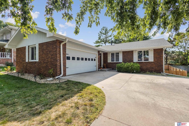 single story home with a front lawn and a garage