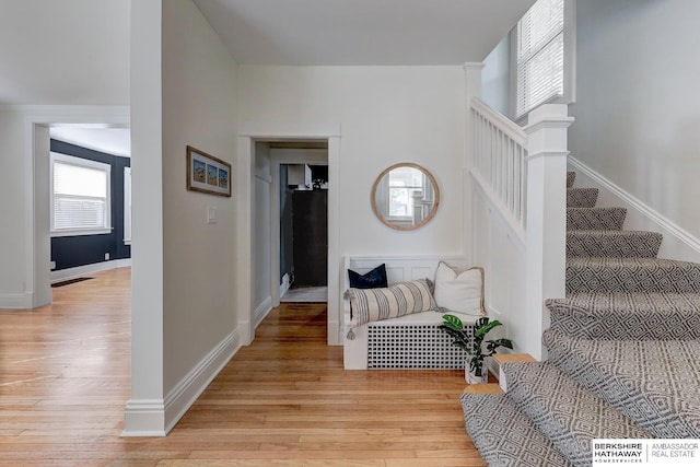 foyer with light hardwood / wood-style flooring