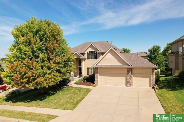 craftsman house featuring a garage and a front lawn