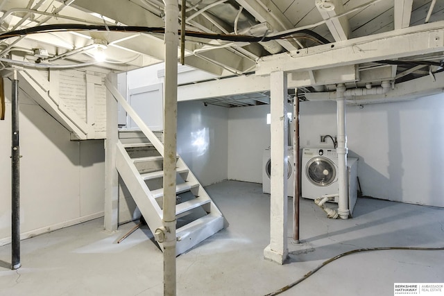 basement featuring washer and dryer