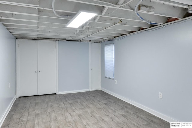 basement with light wood-type flooring